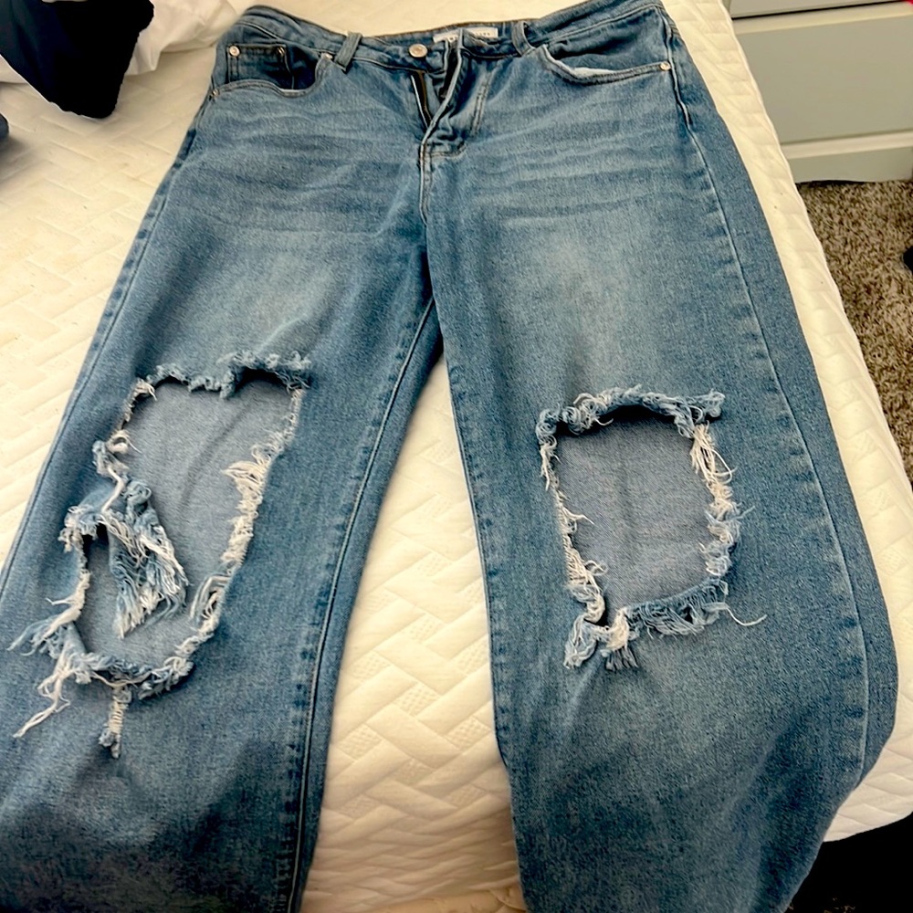 pair of baggy legged blue jeans